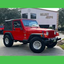 Image result for Flame Red 2005 Jeep