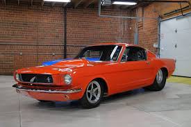 Image result for Poppy Red 1965 Mustang