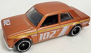 Image result for Gold Bronze 1959 Datsun