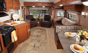 The other side of the camper has a two burner range, and single sink. Hot Water Heater For Jayco Camper