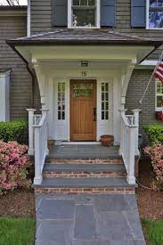 Concrete Brick Front Steps Between White Front Step Railing Aside Pink Flowering Plants Jpg 736 1 104 Pix Front Porch Steps House With Porch Front Porch Design