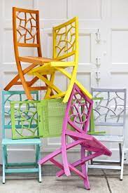 They're handy for barbecues, and you can stack. Color Boost Fifi Folding Chairs Painted Wood Chairs Colorful Patio Colorful Chairs