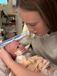 Some sweet sister time at the hospital with Annalise and Laine, and then  bath time! Annalise had a really good day!! She's moving more than she ever  has, she's getting fed and