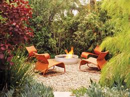 Maybe you would like to learn more about one of these? Cozy Garden Fire Pit With Orange Chairs Backyard Fire Fire Pit Backyard Outdoor Fire Pit