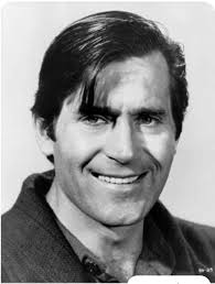 I've always loved this handsome & fun photo of Verna & Clint at home  decorating.