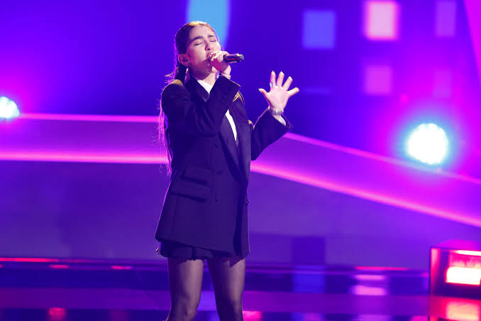Saade sounds so smooth singing Raye's "Oscar Winning Tears.", #TheVoice Monday on NBC and next day on Peacock | The Voice | Facebook