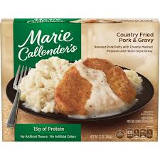 A collection of side by side cooked frozen dinner comparisons where the left is the marketing version of the box and the right is the results of following the microwave cooking instructions. Marie Callender S Frozen Meal Country Fried Pork Chop Gravy 12 Ounce Walmart Inventory Checker Brickseek