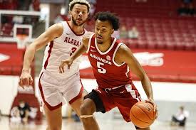Arkansas' moses moody, right, shoots while guarded by kentucky's davion mintz during the second half of an ncaa college basketball game in lexington, ky., tuesday. Wholehogsports Moody S 28 Not Near Enough For Razorbacks In Blowout Loss