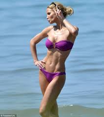 A girls pretty little camel toe can be admired so easily when wearing yoga pants.!!! Sarah Harding Shows Off Her Bikini Body As She Strikes Various Poses For Camera Phone Shoot Daily Mail Online