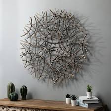 The tv is mounted to one end of the long console, with the opposite side being used as the ideal place to display a few favourite art prints lit by designer lamps. Luxenhome Large Antiqued Gold Abstract Round Metal Wall Art Wha933 The Home Depot