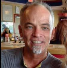 My son Jesse standing outside Guthrie's Alley Cat it was established in  1940 and is the oldest bar in Bakersfield. The establishment was originally  called Oscar's Alley Cat. Located in an alley