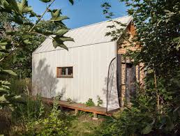 The steeper roof pitch gives you much more space to stack things or to add a loft and store things above. Tiny Loft One Is A Modern Micro Home With A Big Bathtub