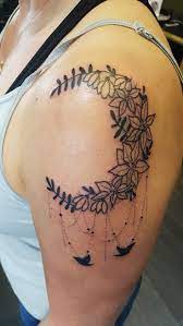 My New Floral Moon Shoulder Tattoo With Snowdrops And Poinsettia Shoulder Tattoo Tattoos Tribal Shoulder Tattoos