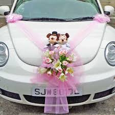 Wedding car decorations add a lovely finishing touch to your wedding vehicle. Bridal Car Decor Wedding Car Decoration