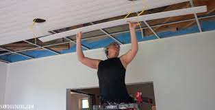 We knew this basement space was going to. Installing Woodhaven Planks And Hiding Ugly Drop Ceiling Grid Sawdust Girl