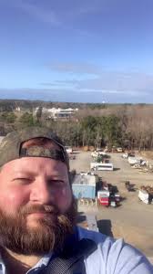 Ladder in Bucket Truck Changing Weatherford Sign
