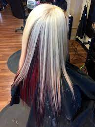 It comes in a wide range of options, from golden blonde with a touch of red to the opposite end of the spectrum—shimmering, golden red. Platinum With Red Underneath And Black Peekaboos Hair Color Underneath Medium Blonde Hair Peekaboo Hair