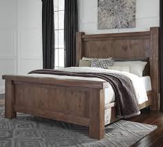 Tamilo King Wood Poster Bed By Signature Design By Ashley King Bedroom Sets Ashley Furniture Bedroom Sets