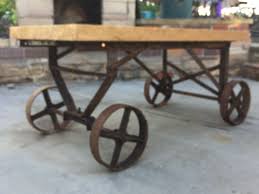 Up Cycled Wheels From A Very Old Air Compressor And We Put A Stone Slab On It T Spray Painting Wood Furniture Painting Wood Furniture Wood Pallet Projects Wall