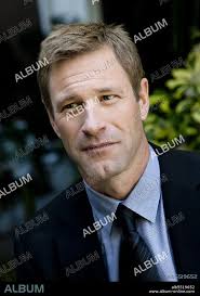 AARON ECKHART. December 8, 2010
