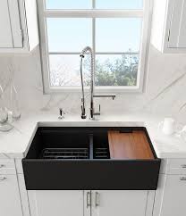 For starters, farmhouse sinks are generally much deeper than other sinks. 20 Farmhouse Kitchen Design Ideas With Black Sink Napier News Farm Style Sink Farmhouse Kitchen Design Black Farmhouse Sink