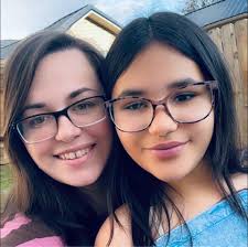 What are some fun and cute crochet patterns for a 21st birthday gift for a  sister who likes monkeys and lily flowers?