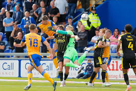 Mansfield Town earn dramatic opening day win after Danny Johnson scores  injury time penalty