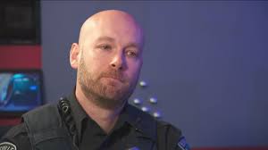 'We're together for life': Surviving Burnsville officer Adam Medlicott  speaks 1 year after shooting