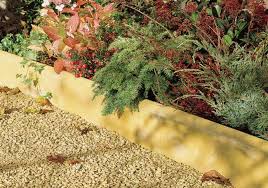 Stone edging as a landscape border. Cheap Bradstone Round Top Edging 2 Colours Awbs
