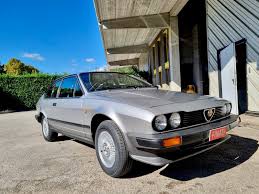Image result for Silver 1985 Alfa-Romeo