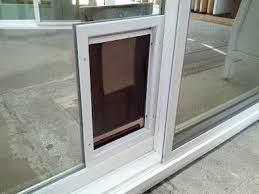 12.diy doggy door mini sliding barn door style! Image From Http Blindsforslidingdoor Com Wp Content Uploads 2012 10 Diy Doggie Doors For Sliding Gla Diy Doggie Door Garage Door Decor Sliding Glass Dog Door