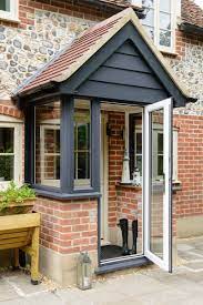 Porches And Doors Create A Stunning Entrance To Any Home This Anglian Anthracite Grey Porch With Pitched Roof Is Brick Porch House With Porch Porch Extension