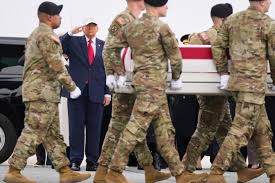 President Trump and First Lady attend dignified transfer at Dover Air Force  Base of six soldiers killed in Iran war | The Independent