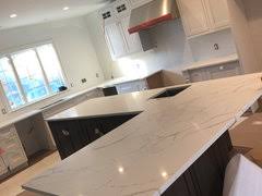 What kind of backsplash do you use for a sub zero fridge? Calacatta Laza What Kind Of Backsplash