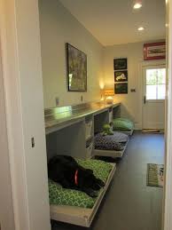Example Of A Trendy Galley Utility Room Design In Other With Flat Panel Cabinets Medium Tone Wood Cabinets Stainle Dog Rooms Dog Bedroom Utility Room Designs