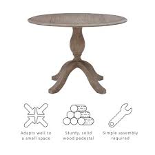 It is made of stainless steel and has four bent legs at the bottom, bent and overlapping on a smooth metal surface. Small Pedestal Dining Table Target