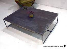 Zinc coffee table with blackened steel base. Zinc Top Coffee Table