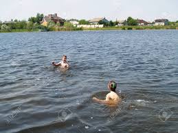 Children Swim And Having Fun In The River Stock Photo, Picture and Royalty  Free Image. Image 91268460.