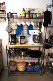 Make The Most Of Your Space In A Small Kitchen Kitchen Appliance Storage Small Kitchen Appliance Storage Bakers Rack Kitchen