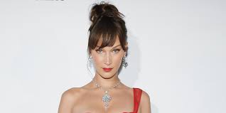 Bella hadid just made her mark on cannes 2016! Bella Hadid Wears A Red Sheer Dress At Cannes Bella Hadid Cannes Fashion