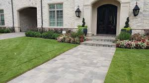 Square pavers arranged geometrically in the backyard of this home create a distinctive walkway through and around the yard. Best Pavers For Walkway Paver Walkway Installation Plano Tx Legacy Custom Pavers