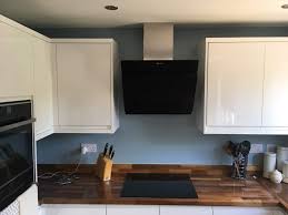 Grey gloss kitchen units with oak worktops for kitchens. J Pull Gloss White Kitchen European Walnut Wooden Worktops Precision Kitchens