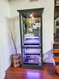 Because this option is made out of old windows, it's easy to decorate with glass paints. Diy Indoor Greenhouse Cabinet From An Old Display Cabinet Refresh Living