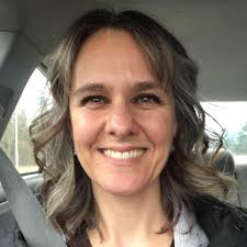 Should I water my dahlia tubers after late planting in Vermont?