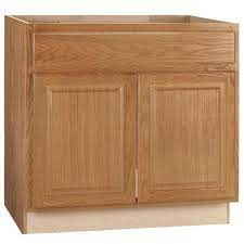 The representative there then suggested we look at refacing the cabinets as well. Hampton Bay Hampton Medium Oak Raised Panel Stock Assembled Sink Base Kitchen Cabinet 36 In X 34 5 In X 24 In Ksb36 Mo The Home Depot