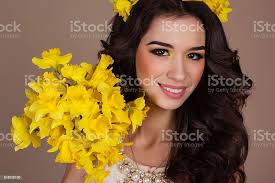 Pretty Smiling Girl With Yellow Flowers Stock Photo