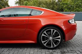 Image result for Magma Red 2012 Aston Martin