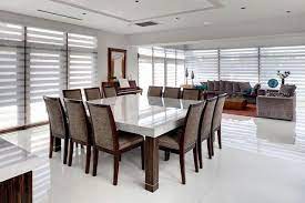 A good 12 person dining table, made using solid wood the table is large enough to accommodate a crowd and still fit into any standard dining room. 12 Person Dining Room Table Luxury Square Dining Table For 12 People Dream Homes Square Dining Room Table Large Dining Room Table 12 Seater Dining Table