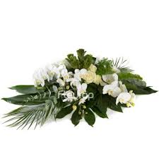 Crafted by a local florist, standing sprays are sent by friends and family members to express condolences, either as a group or as individuals. Funeral Teardrop Spray White Elegance 1 Funeral Florist