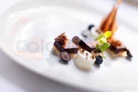 Seafood appetizer and other food on table. Fine Dining Chocolate Dessert Stock Image Colourbox